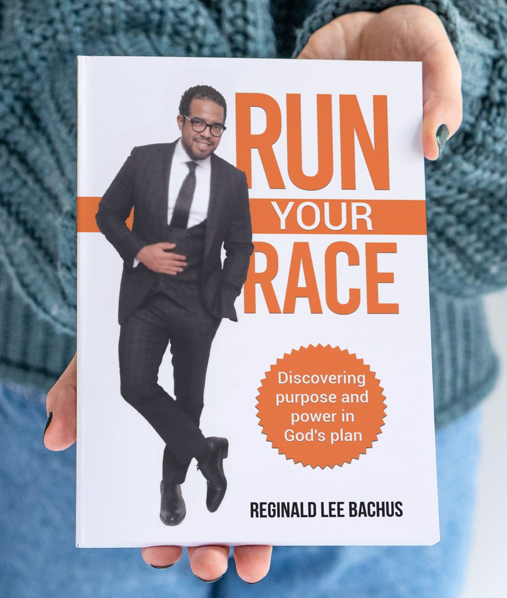 A reader holding Run Your Race